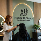 Custom Hair Salon Logo Wall Sign in Black Acrylic with Scissors and Comb Design for Botanical Studio Branding and Interior Decor