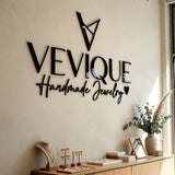 Custom 3D Acrylic Business Sign for Salon Wall Branding with Glossy Black Letters and Modern Logo Design for Professional Interiors